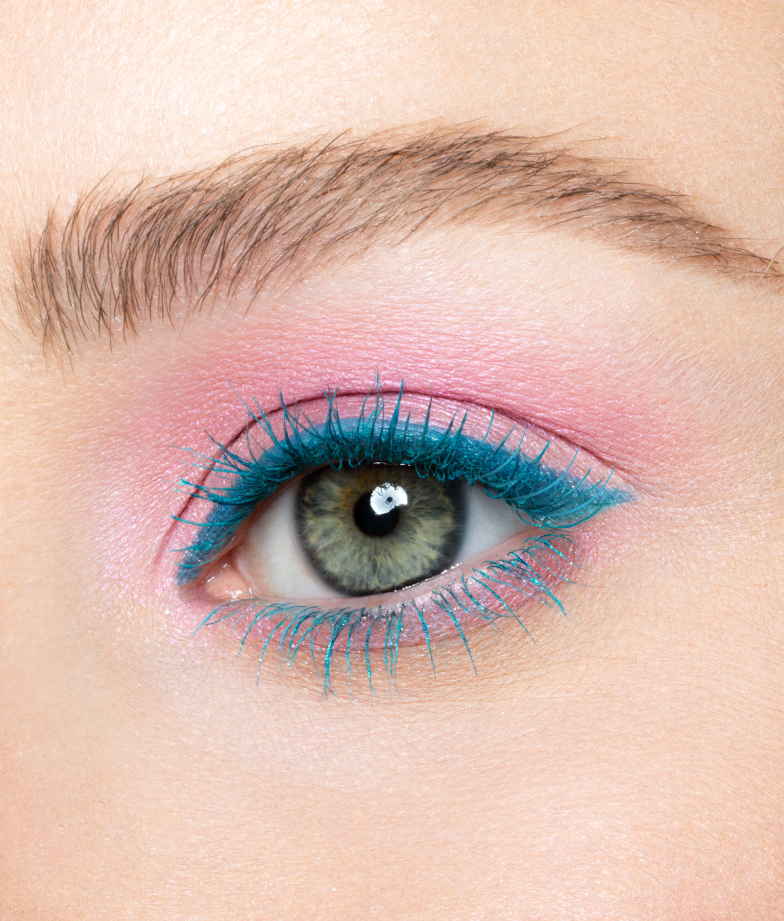 Macro beauty photograph of an Urban Decay mascara eye look in blue
