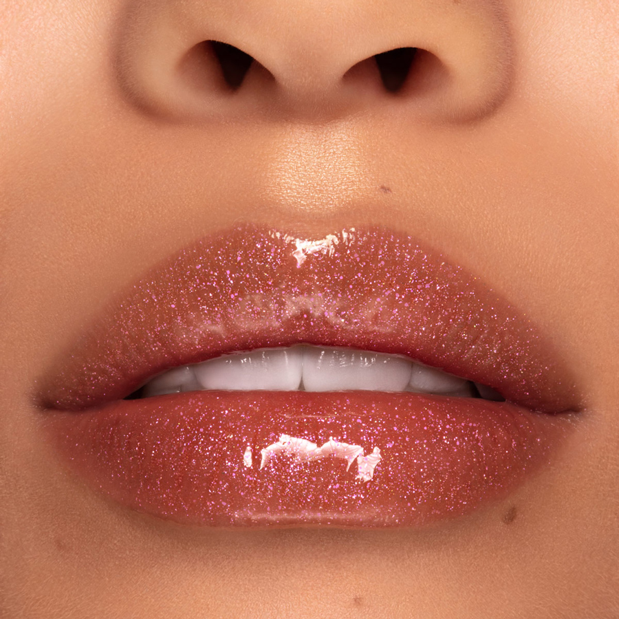 Beauty photograph of Pat McGrath Labs LUST: Gloss in Bronze Venus, macro lip