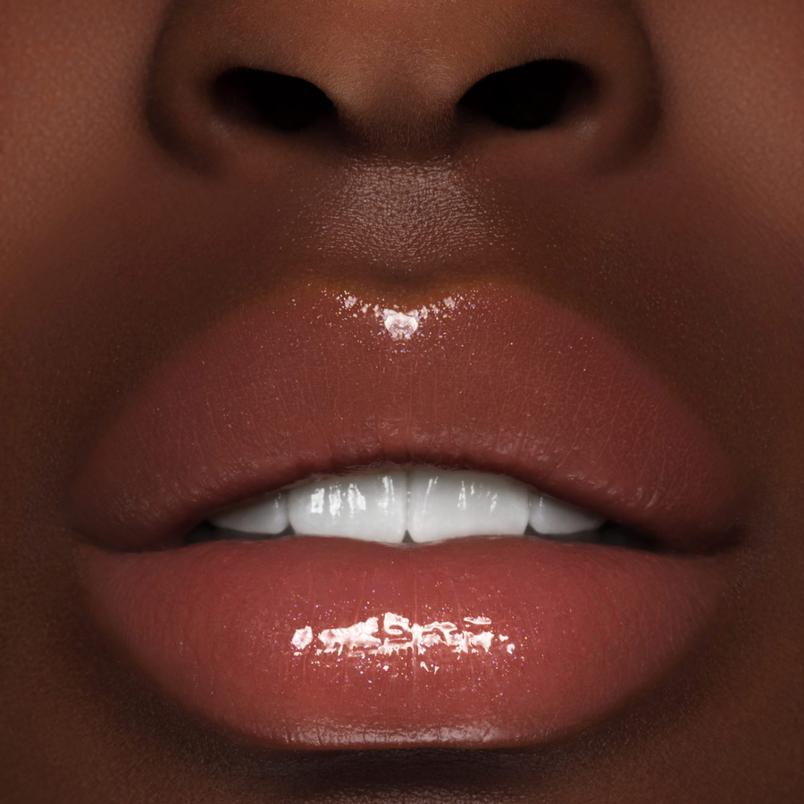 Beauty photograph of Pat McGrath Labs LUST: Gloss in Wicked Whisper, high gloss lip