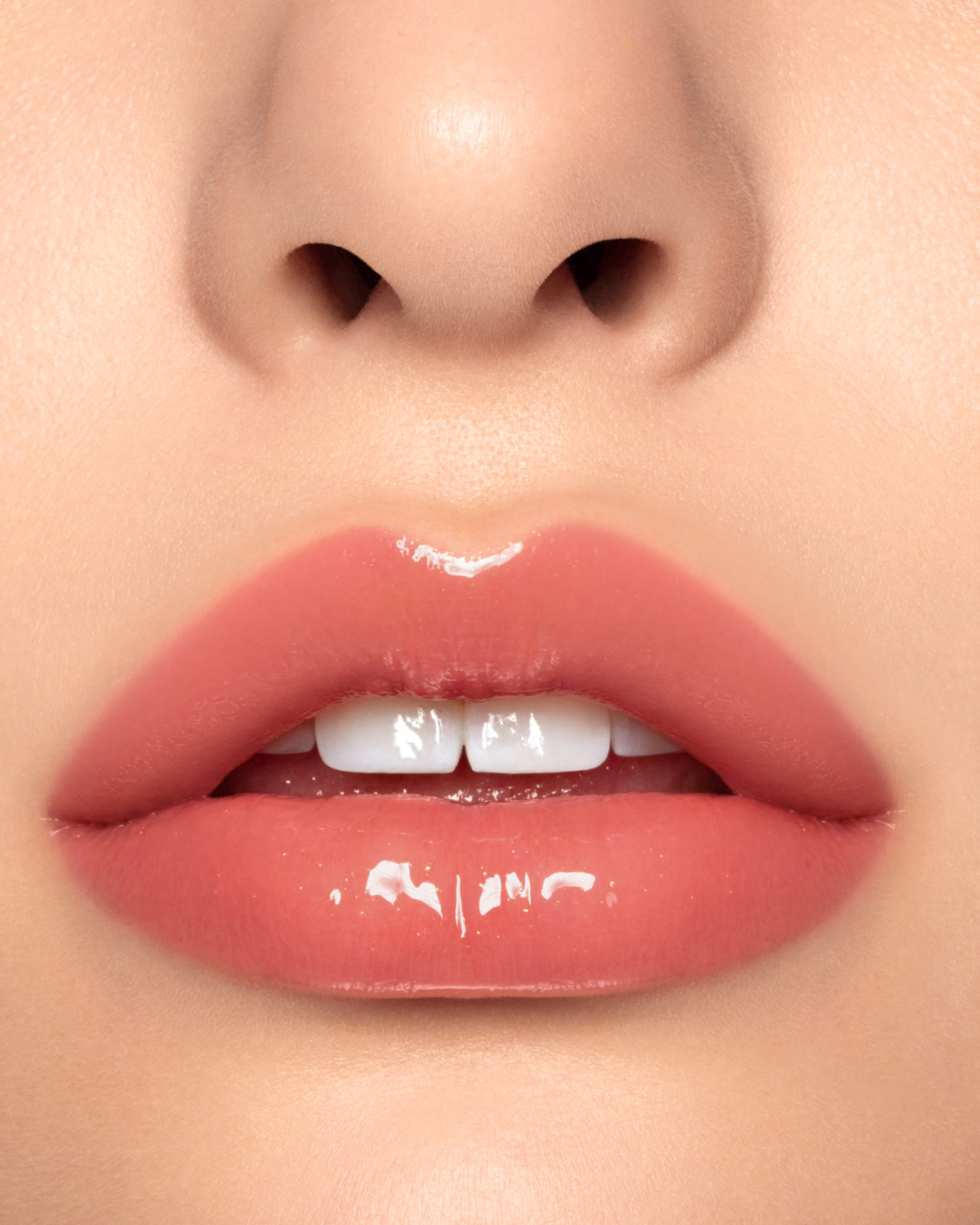 Beauty photograph of Pat McGrath Labs LUST: Gloss in Wicked Whisper, macro lip